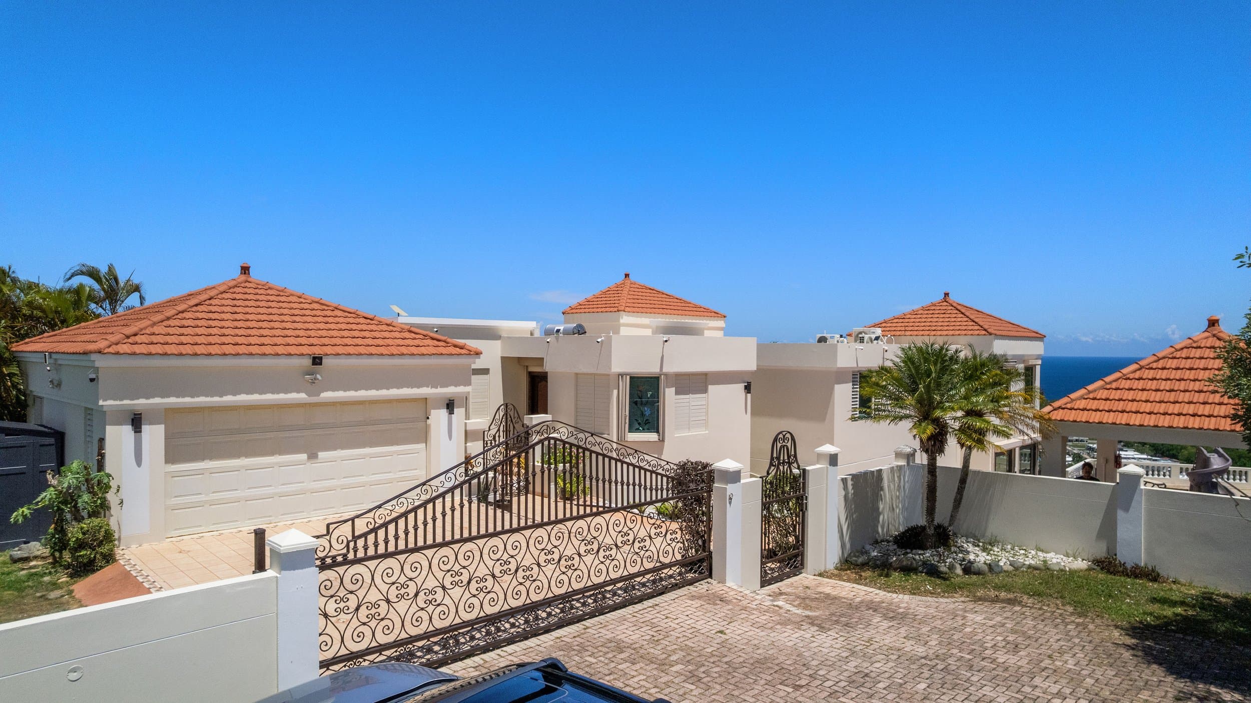 Aerial view of Casa Nakhla, its pool terrace and the Atlantic Ocean