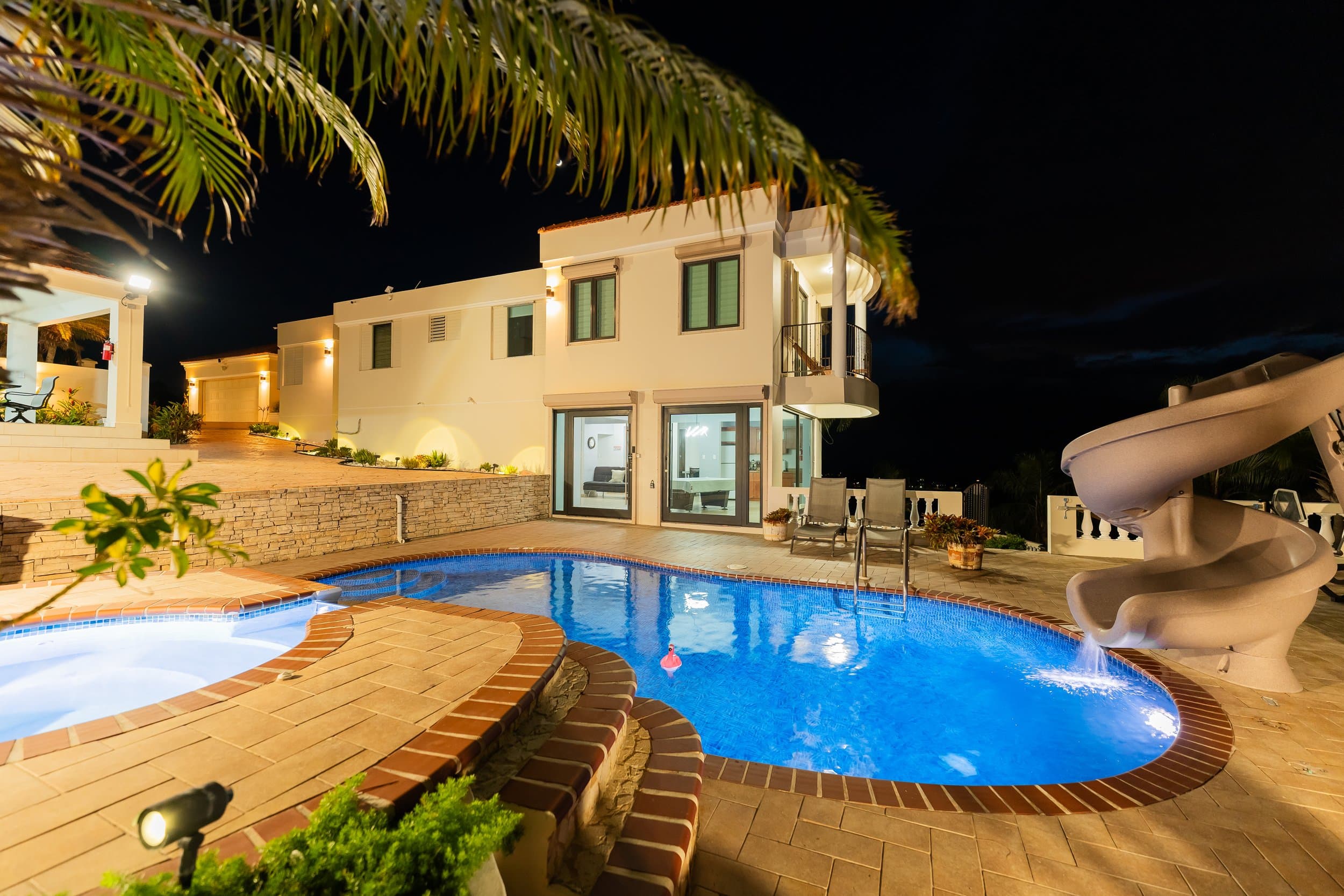 The pool glowing at dusk