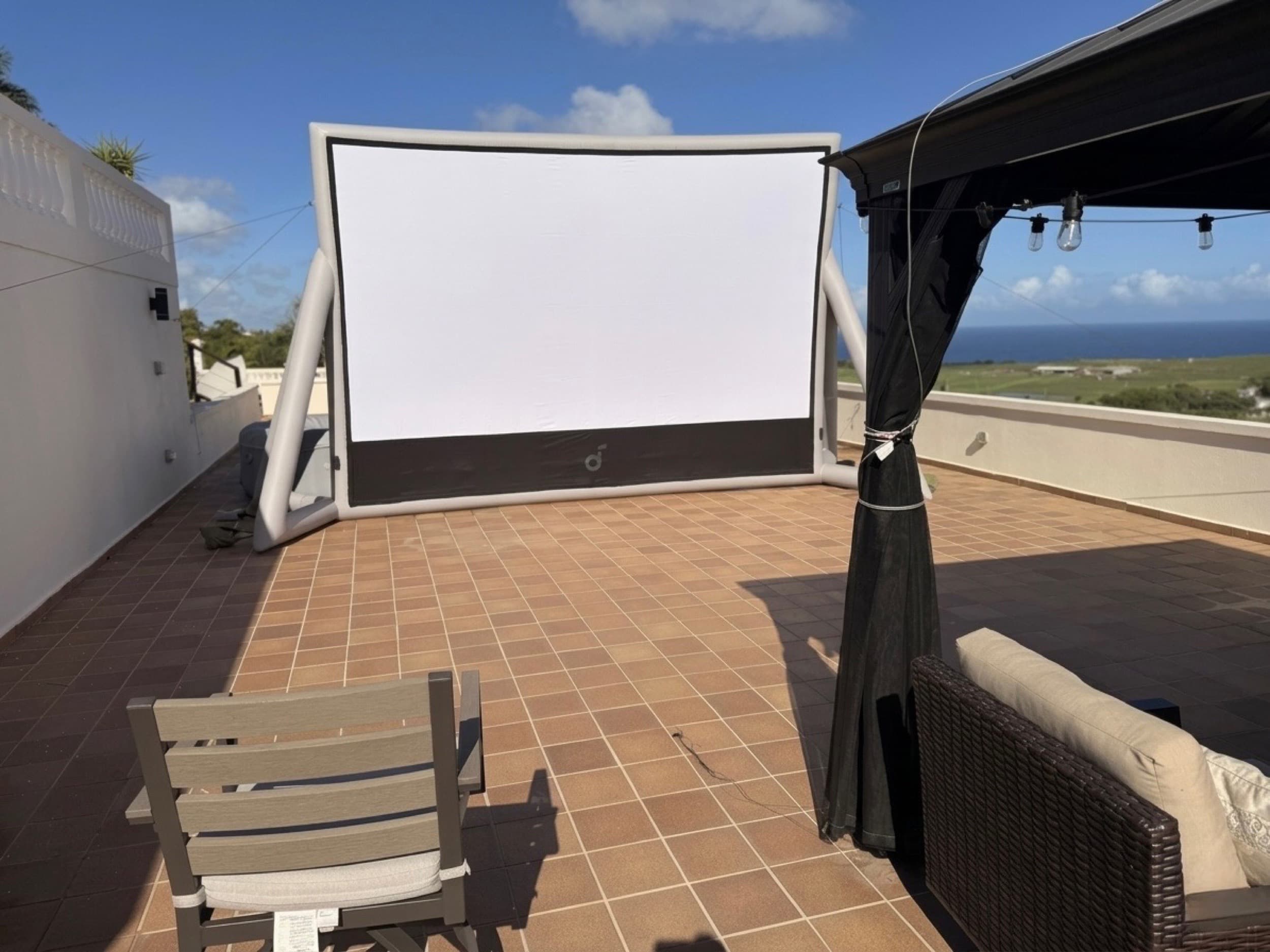 The outdoor screen set up with the Atlantic behind it